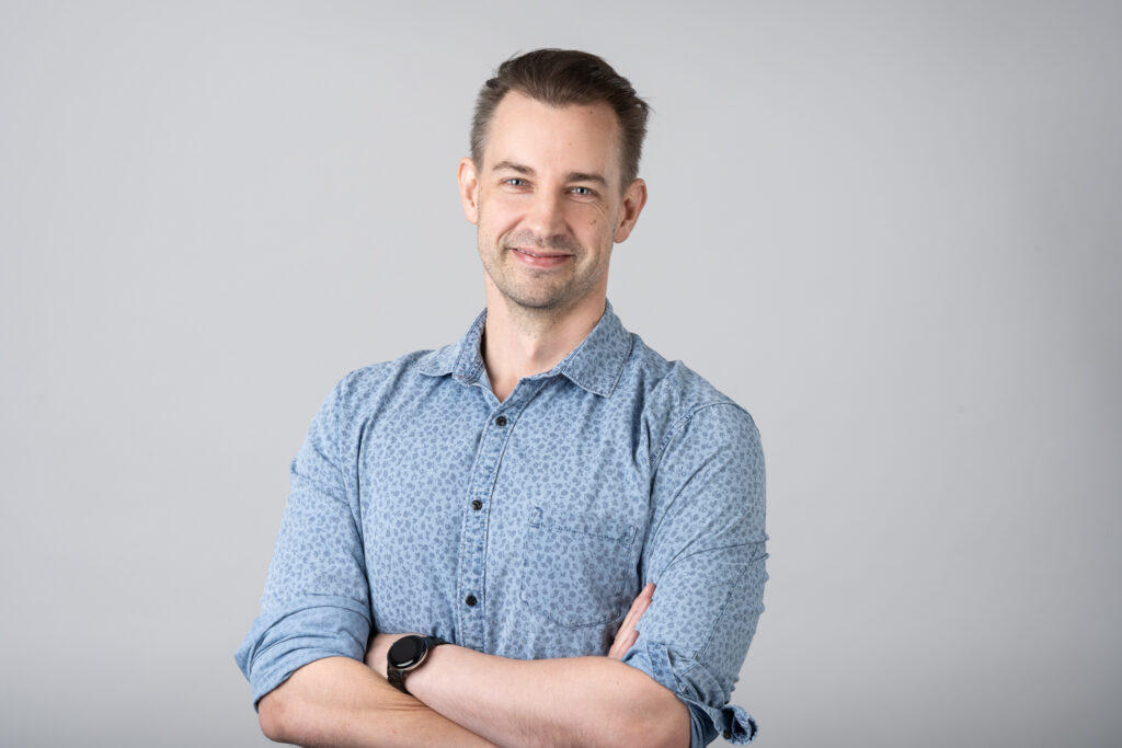 Corporate Headshot of a businessman on a grey background