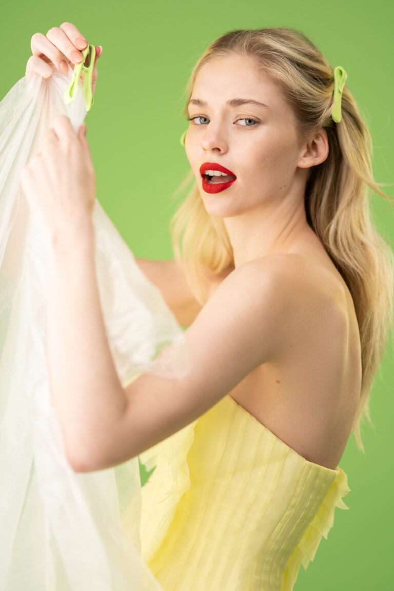 Model against a green background