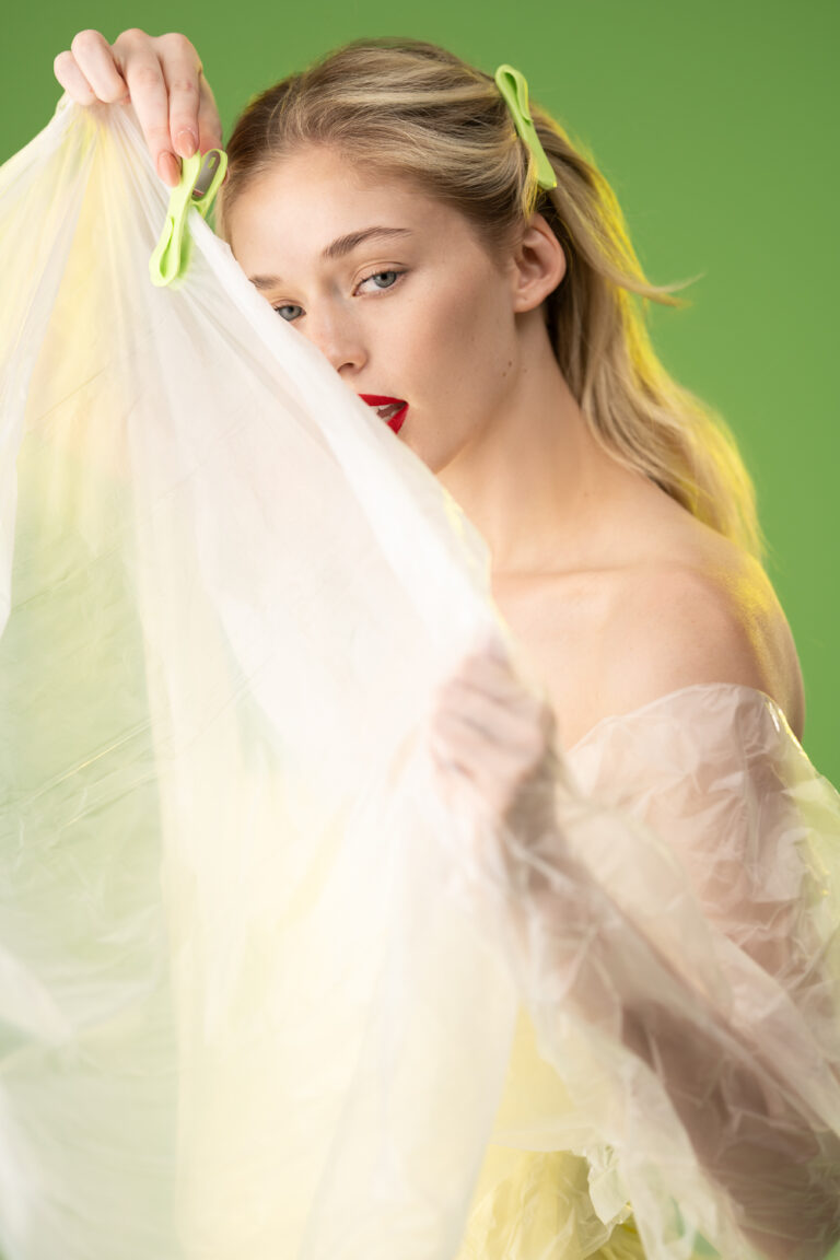 Model against a green background