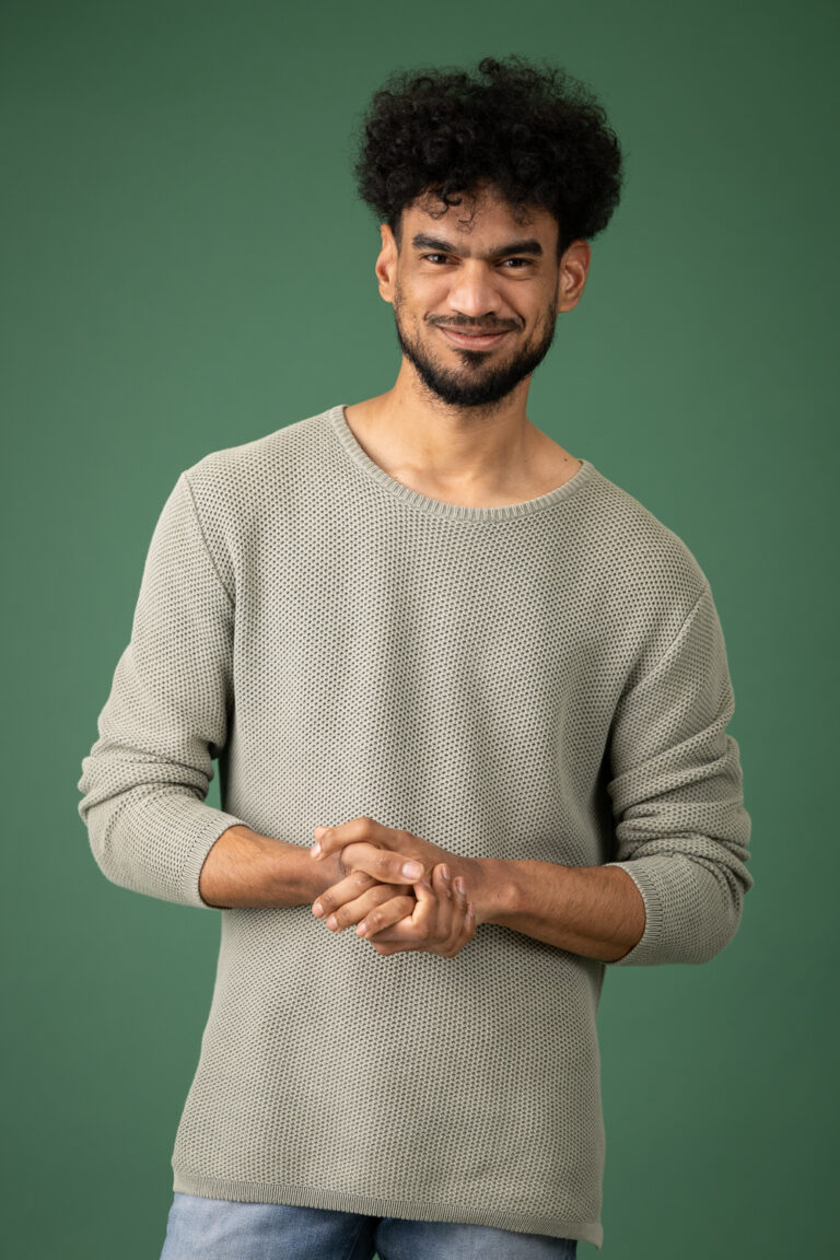 Portrait against a Deep Green Background