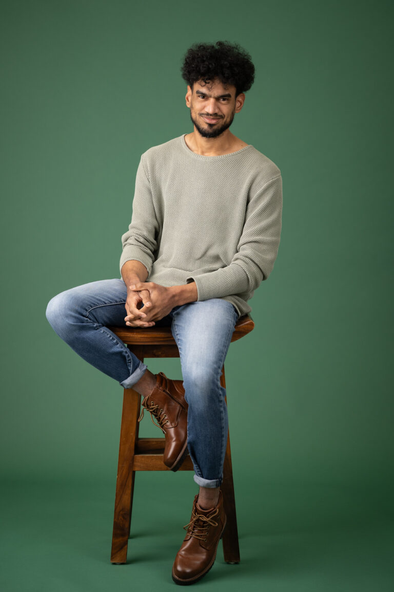 Portrait against a Deep Green Background