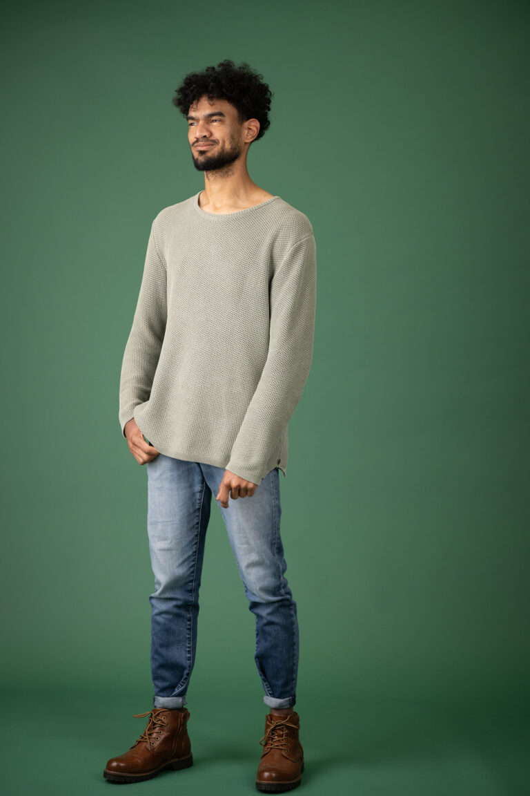 Portrait against a Deep Green Background